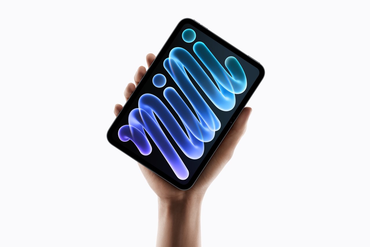 The new iPad mini with an OLED display, held in one hand