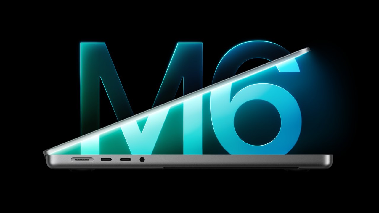 The 14-inch MacBook Pro with M6, half open in front of a large M6 logo